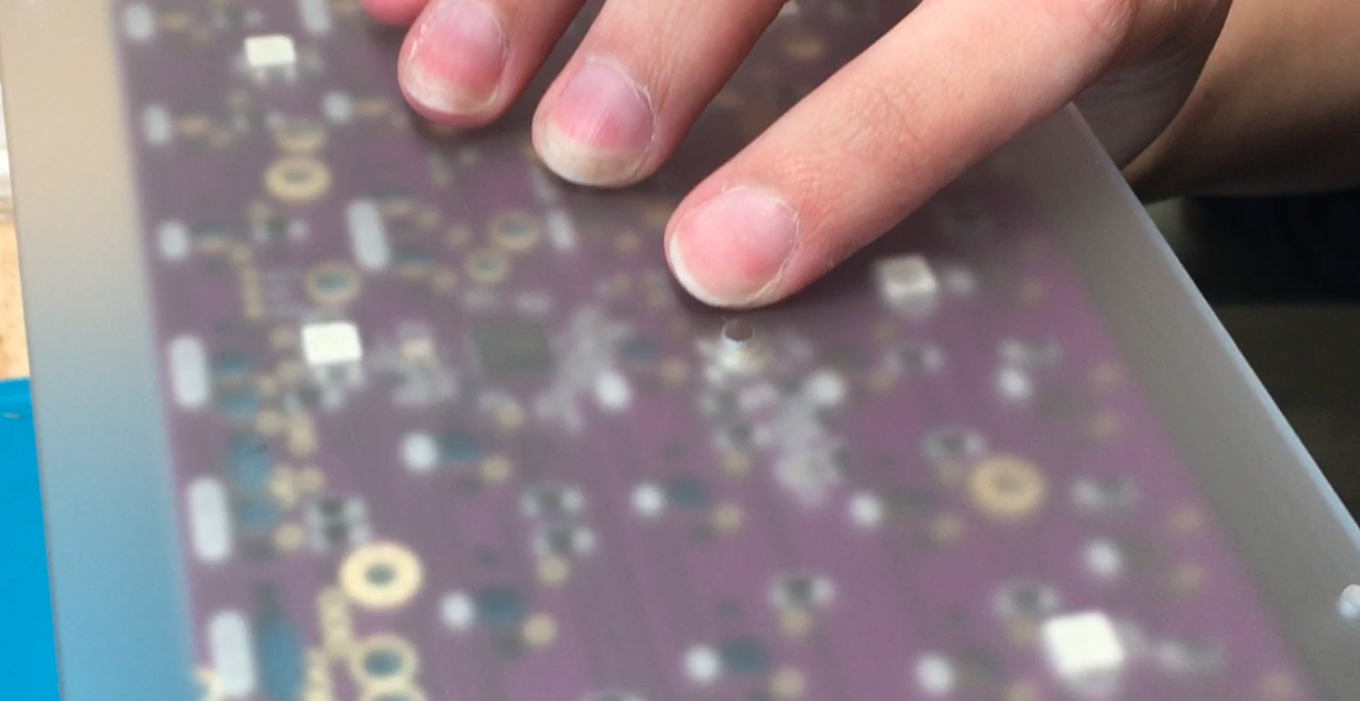 Lining up reset button hole on acrylic with PCB