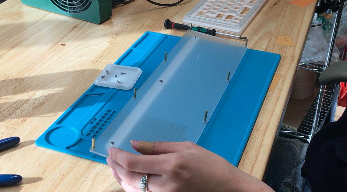 Stacking bottom layer pieces with standoffs