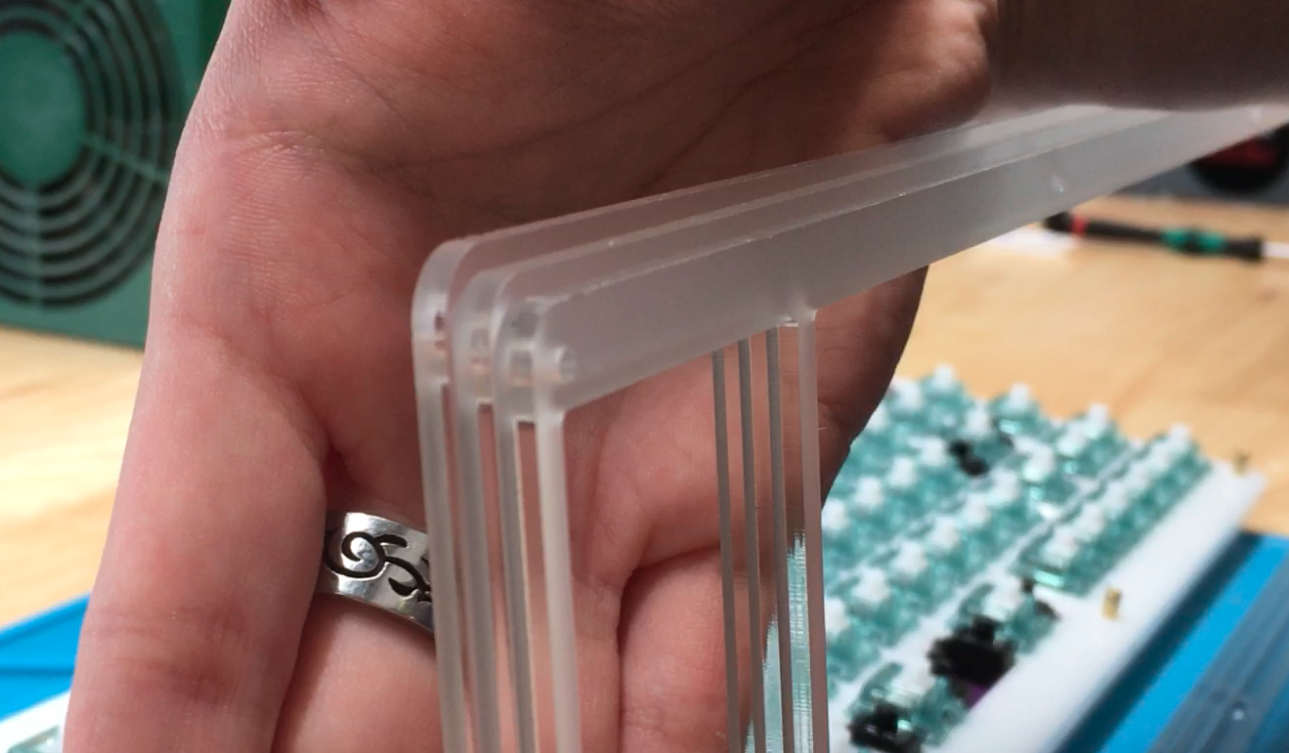 Three top acrylic pieces showing correct stacking order
