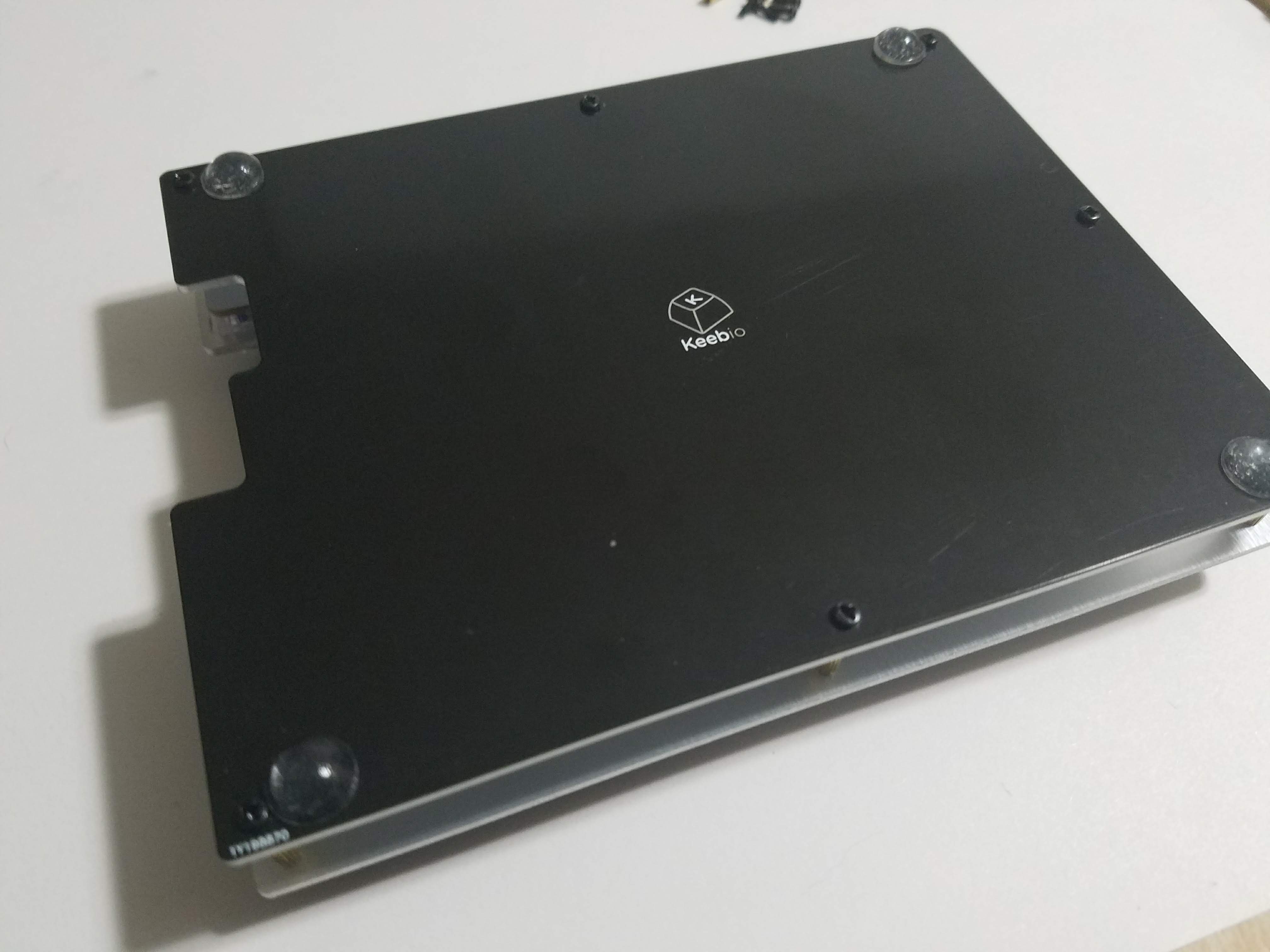 Left half assembled with standoffs and screws
