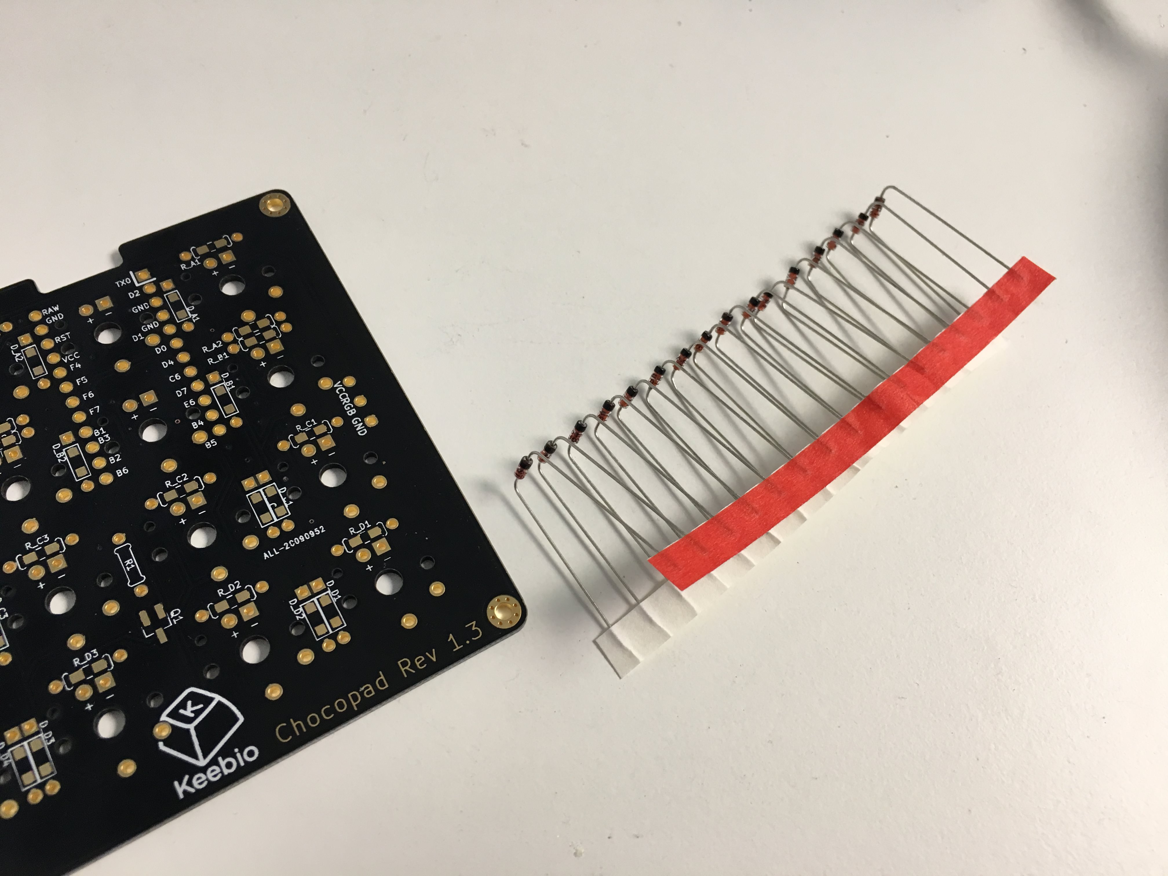 PCB with bent diodes ready to insert