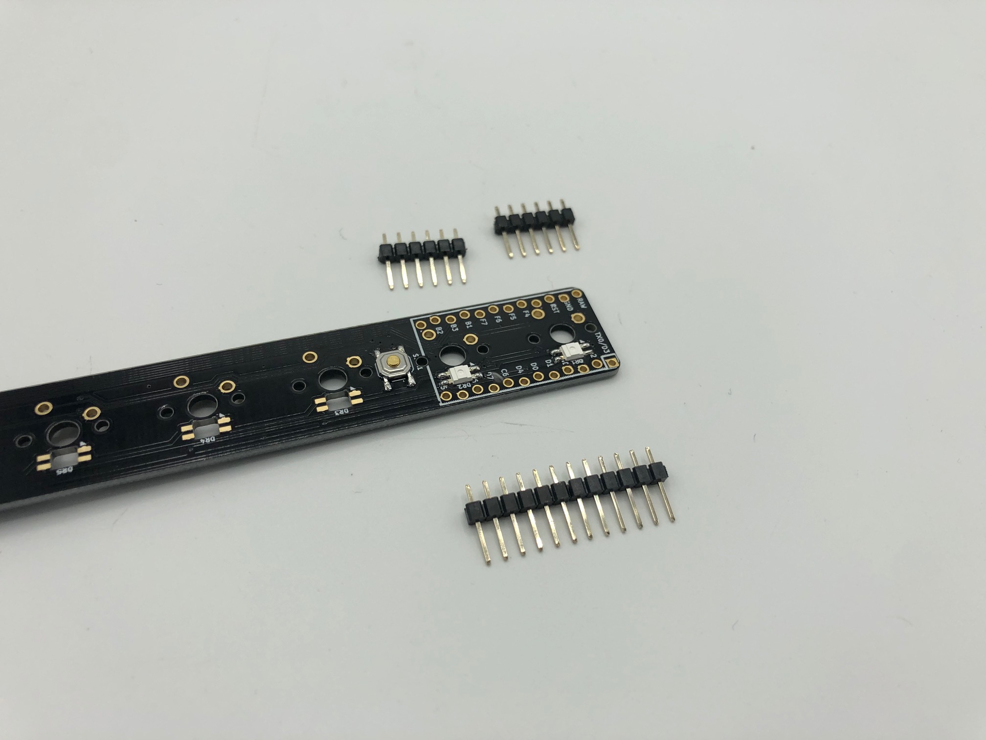 PCB with Six-Pin Header Pieces