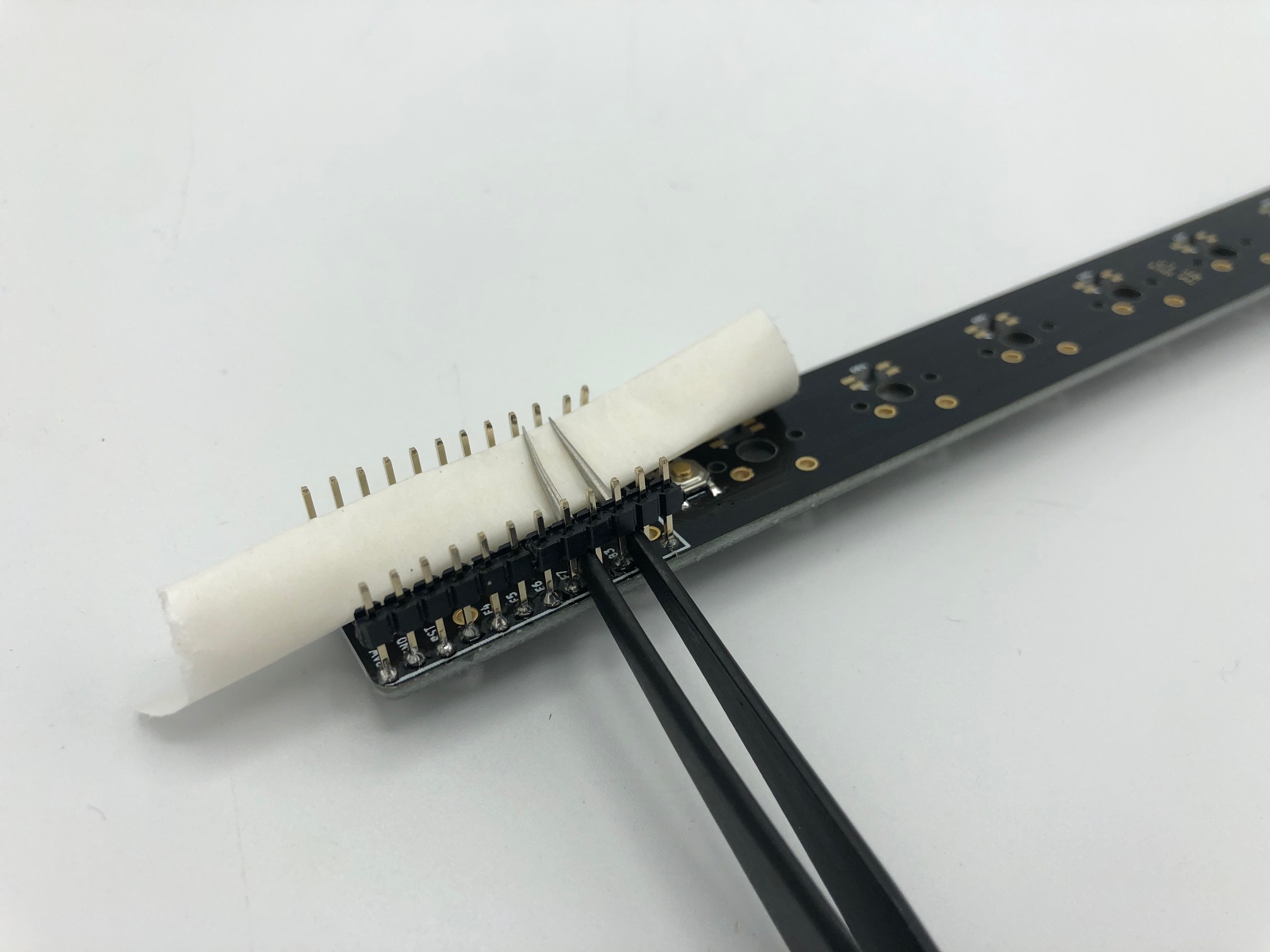 Paper Protecting PCB During Plastic Removal