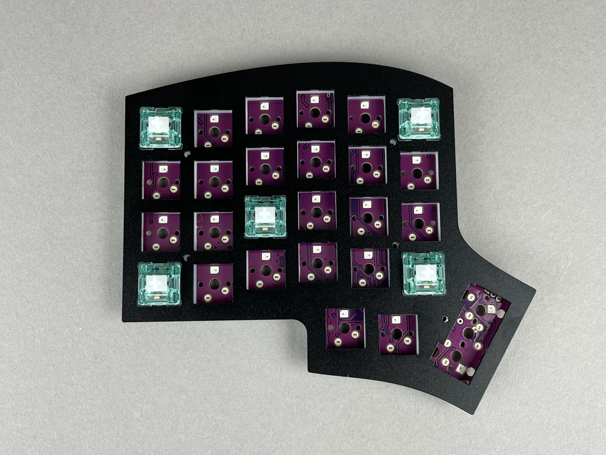 Corner switches inserted in switch plate