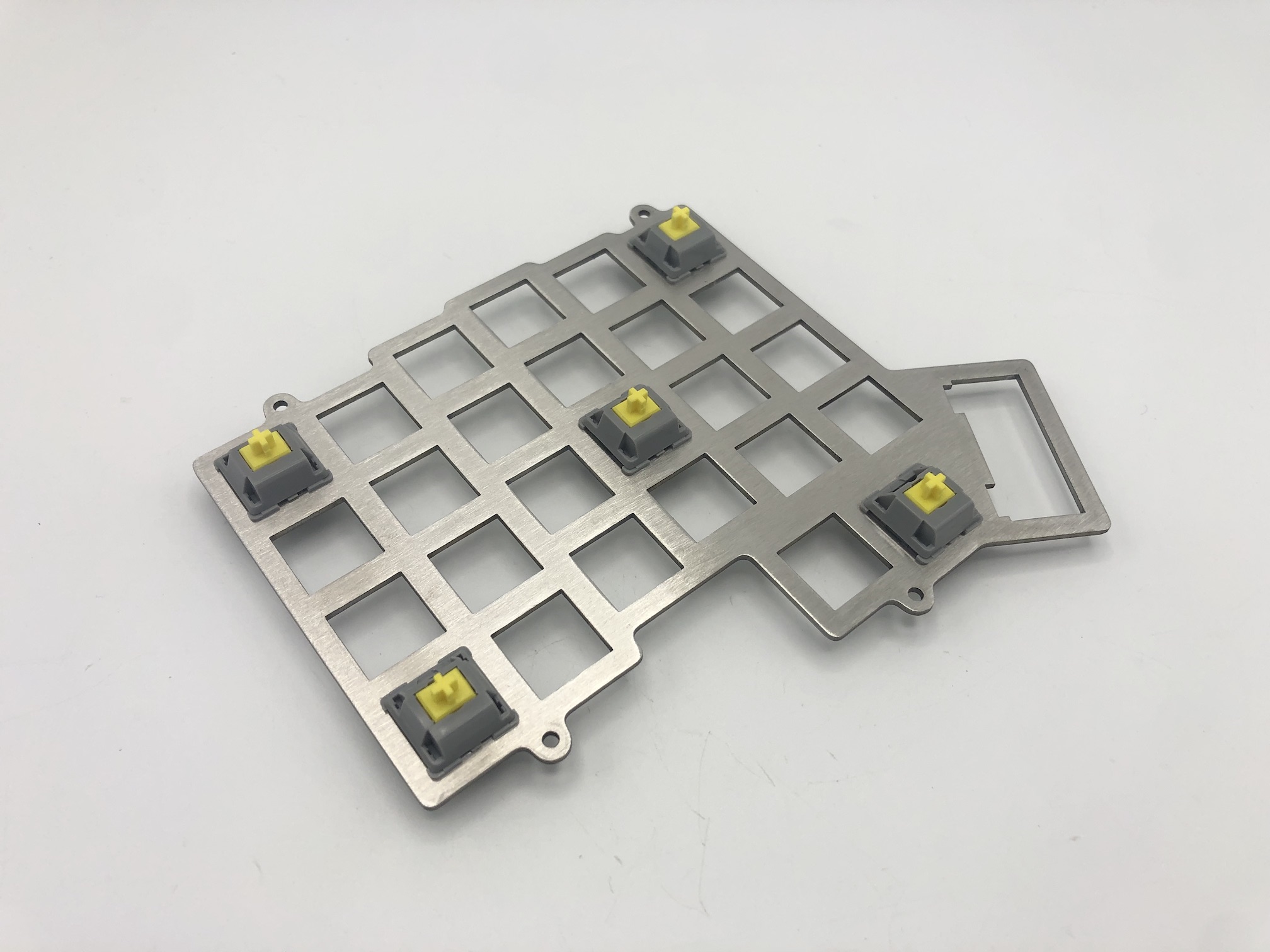 Corner switches in stainless steel switch plate