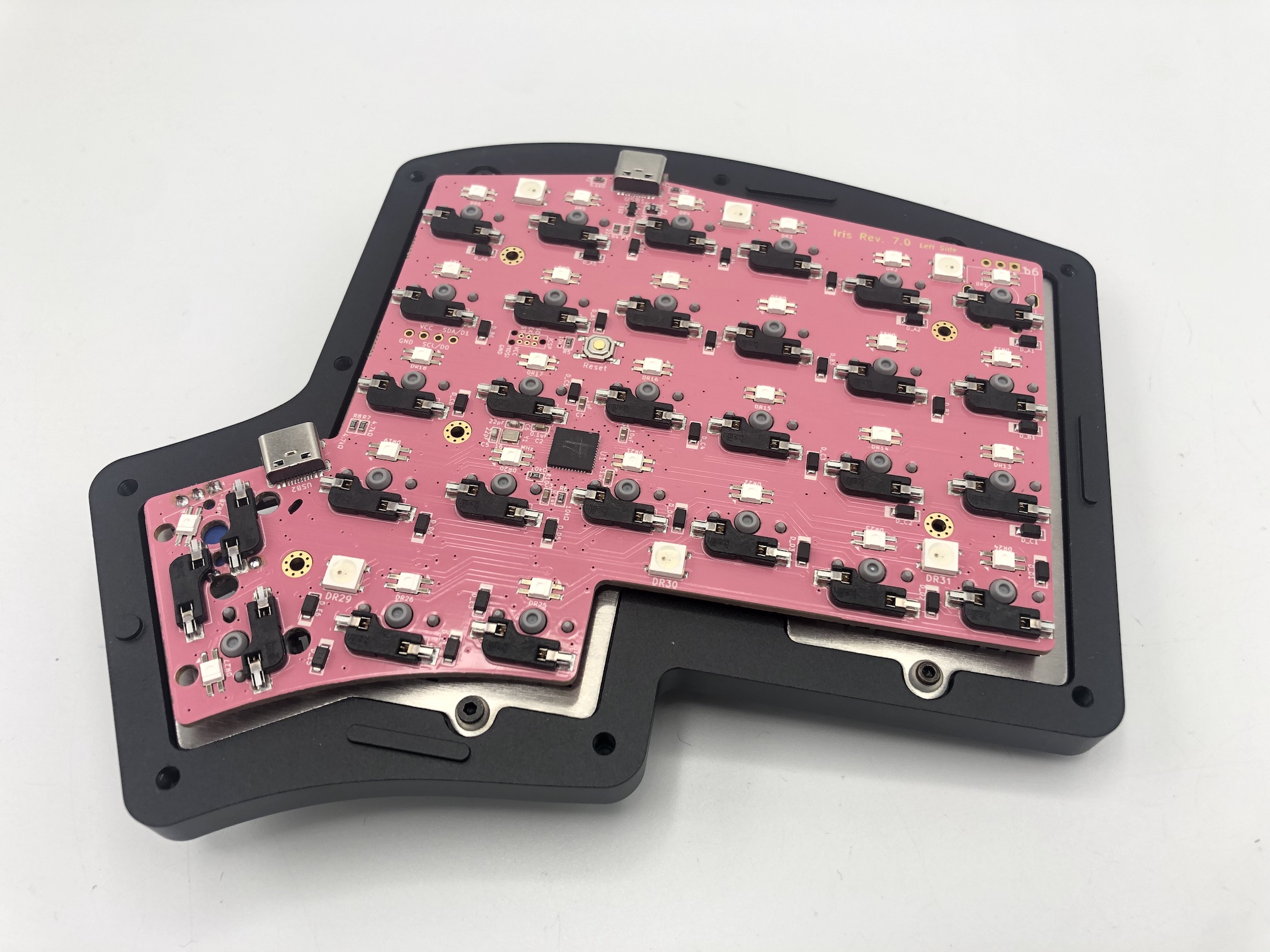 Switch plate screwed into aluminum case top