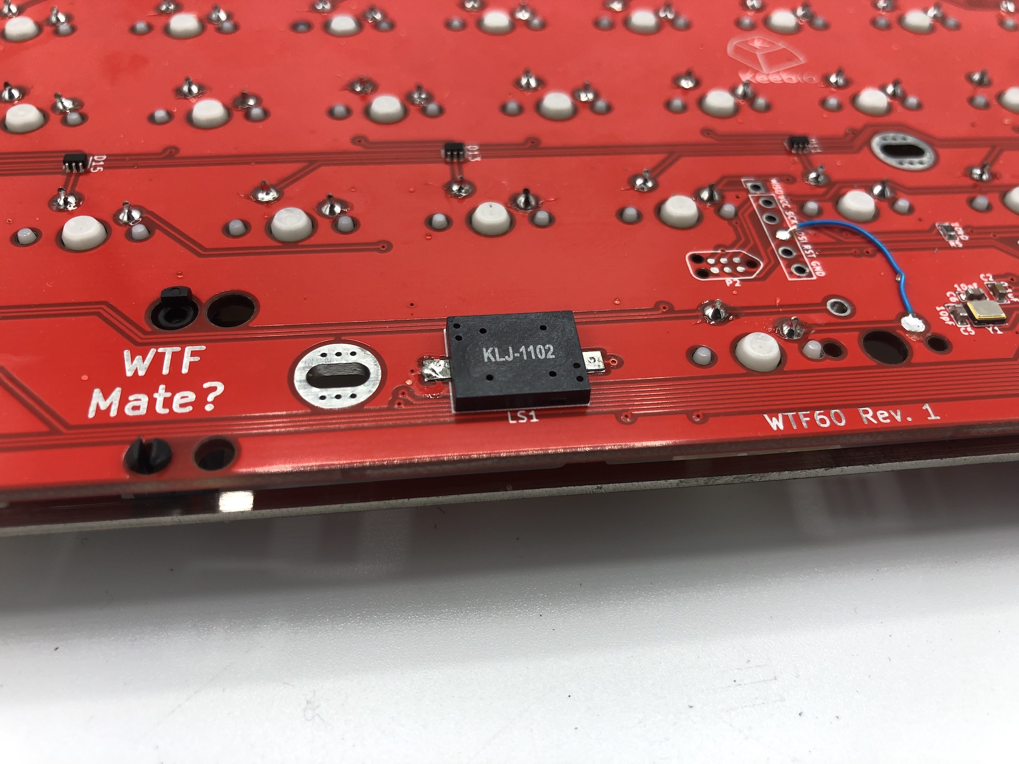 Piezo speaker soldered to LS1 pad