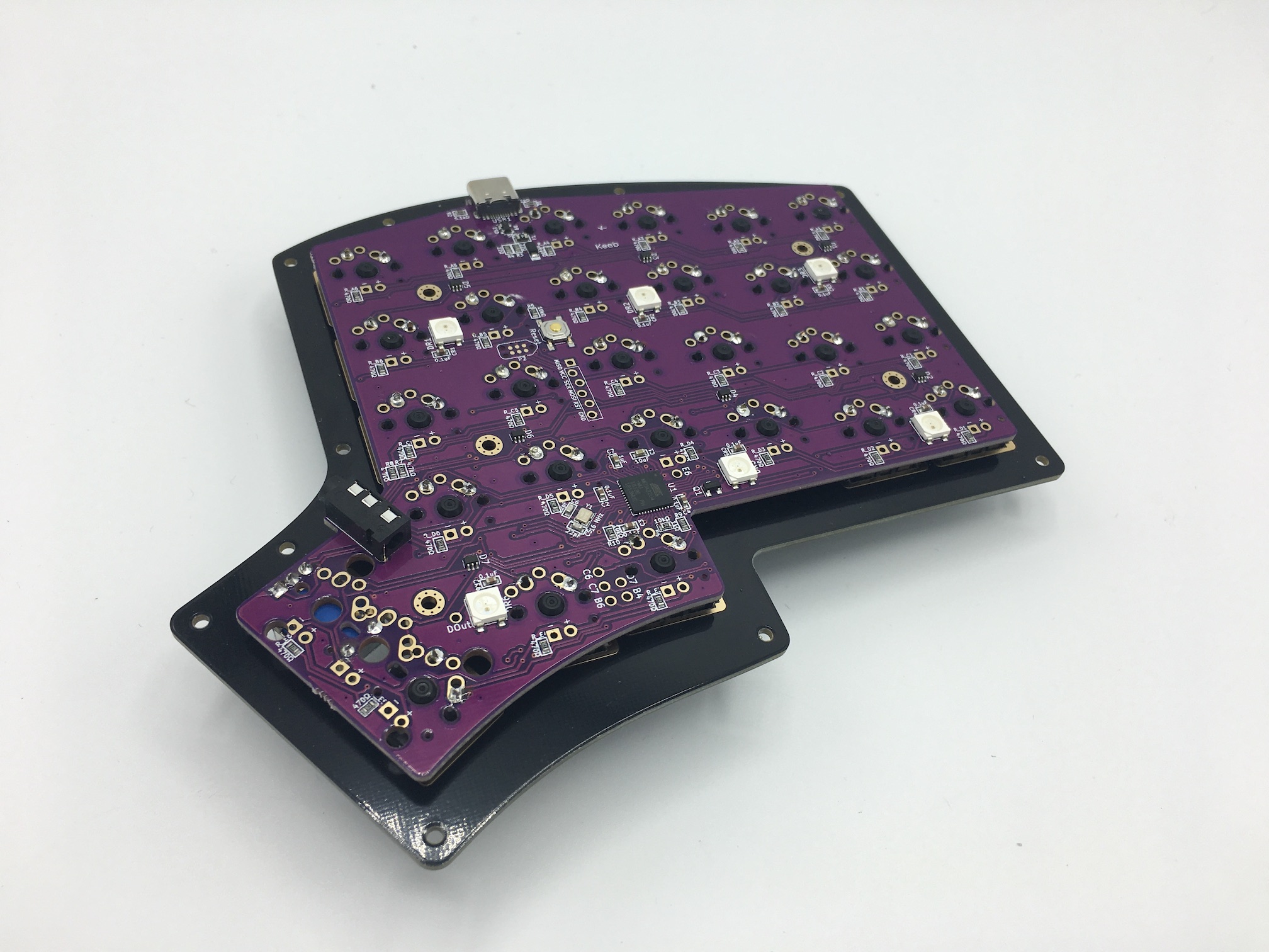 Both PCB halves with all switches soldered