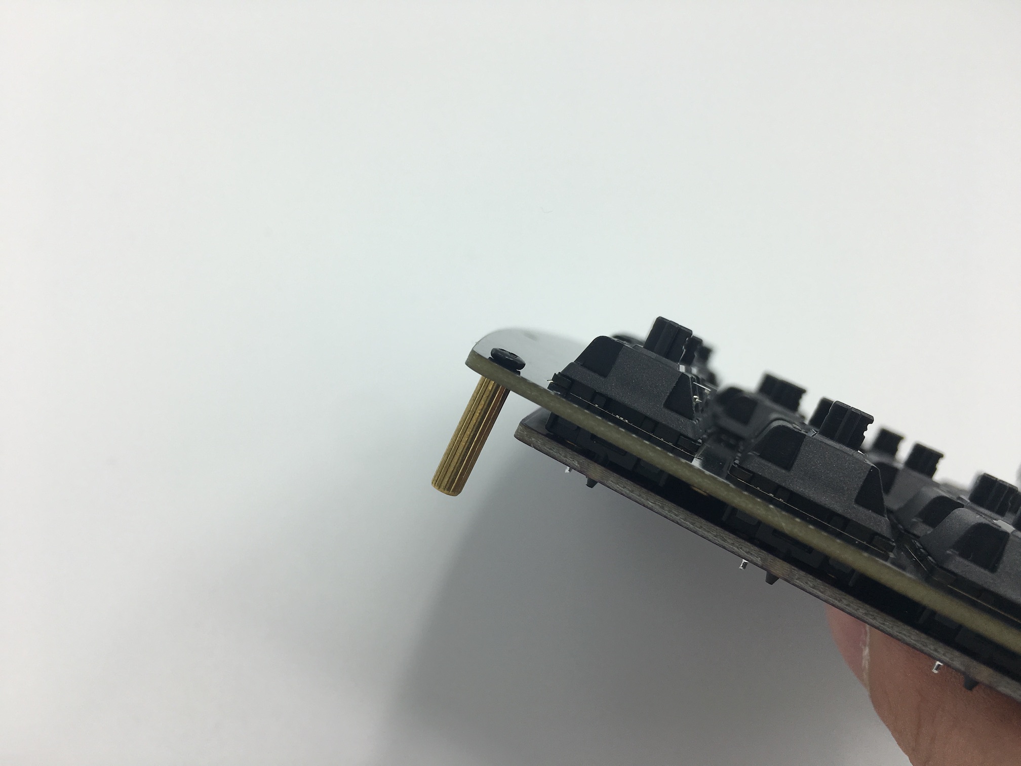 Standoff attached to switch plate edge