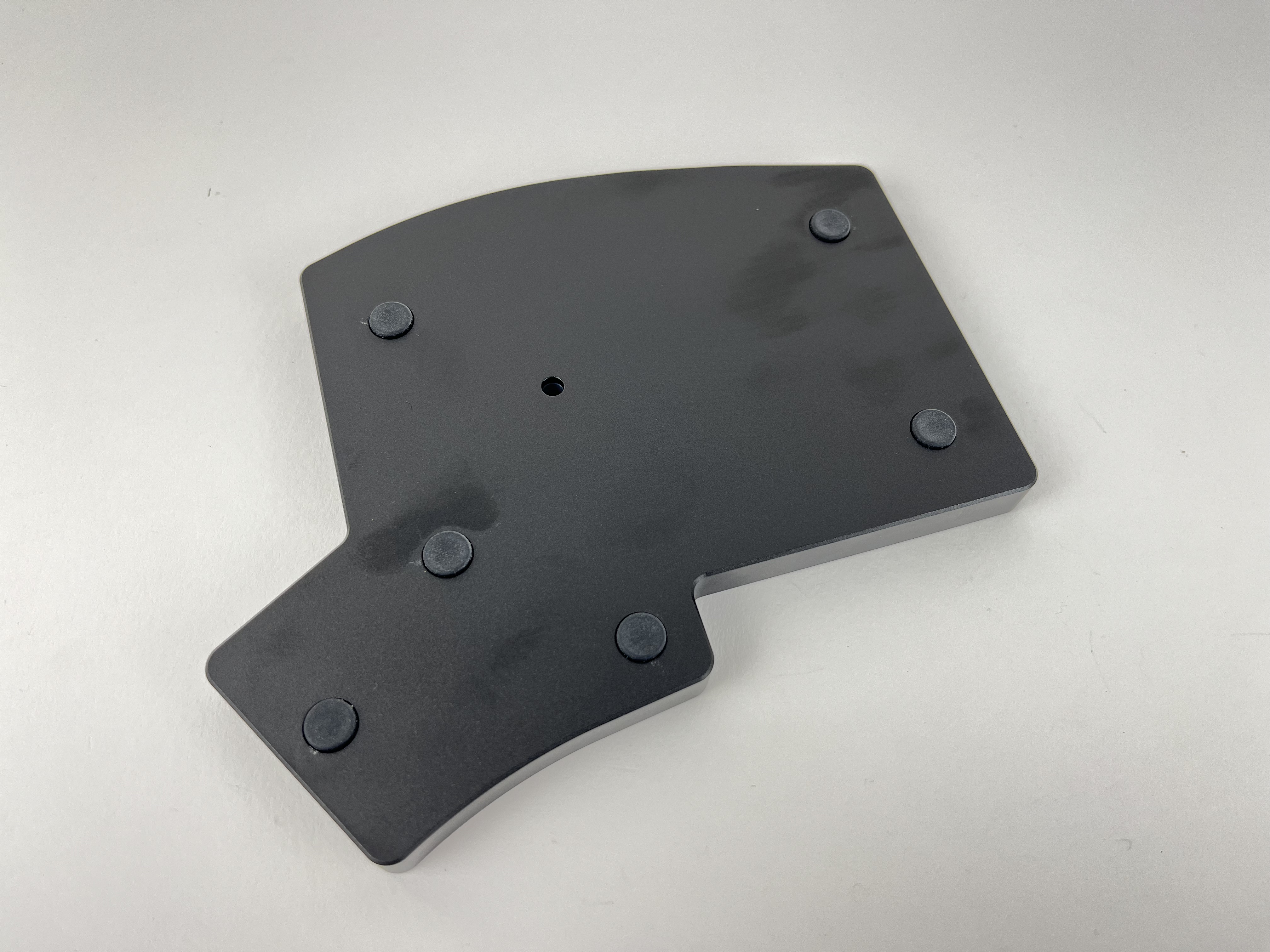 Case tray bottom with silicone bumpers