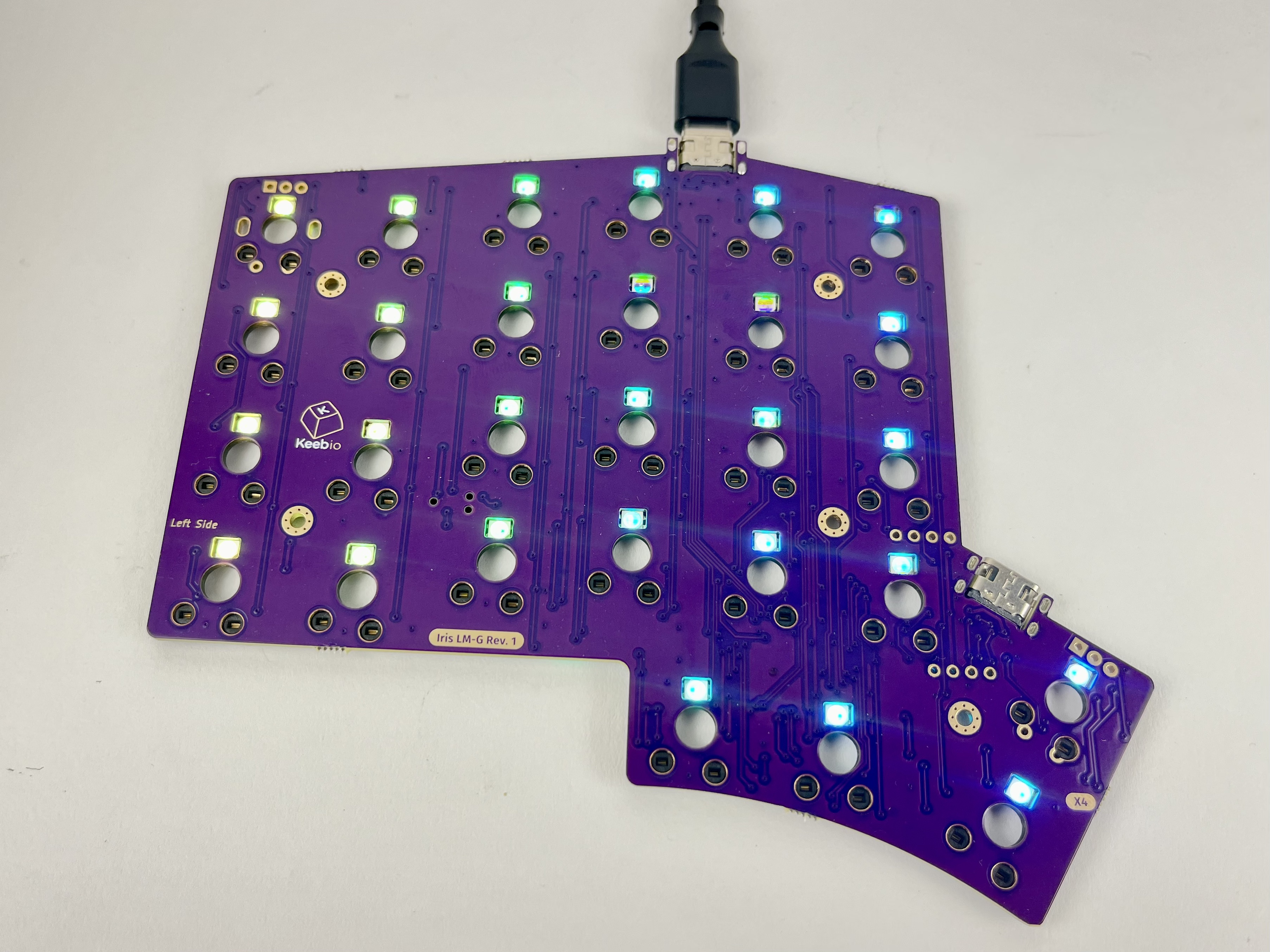 PCB plugged in with LEDs lit