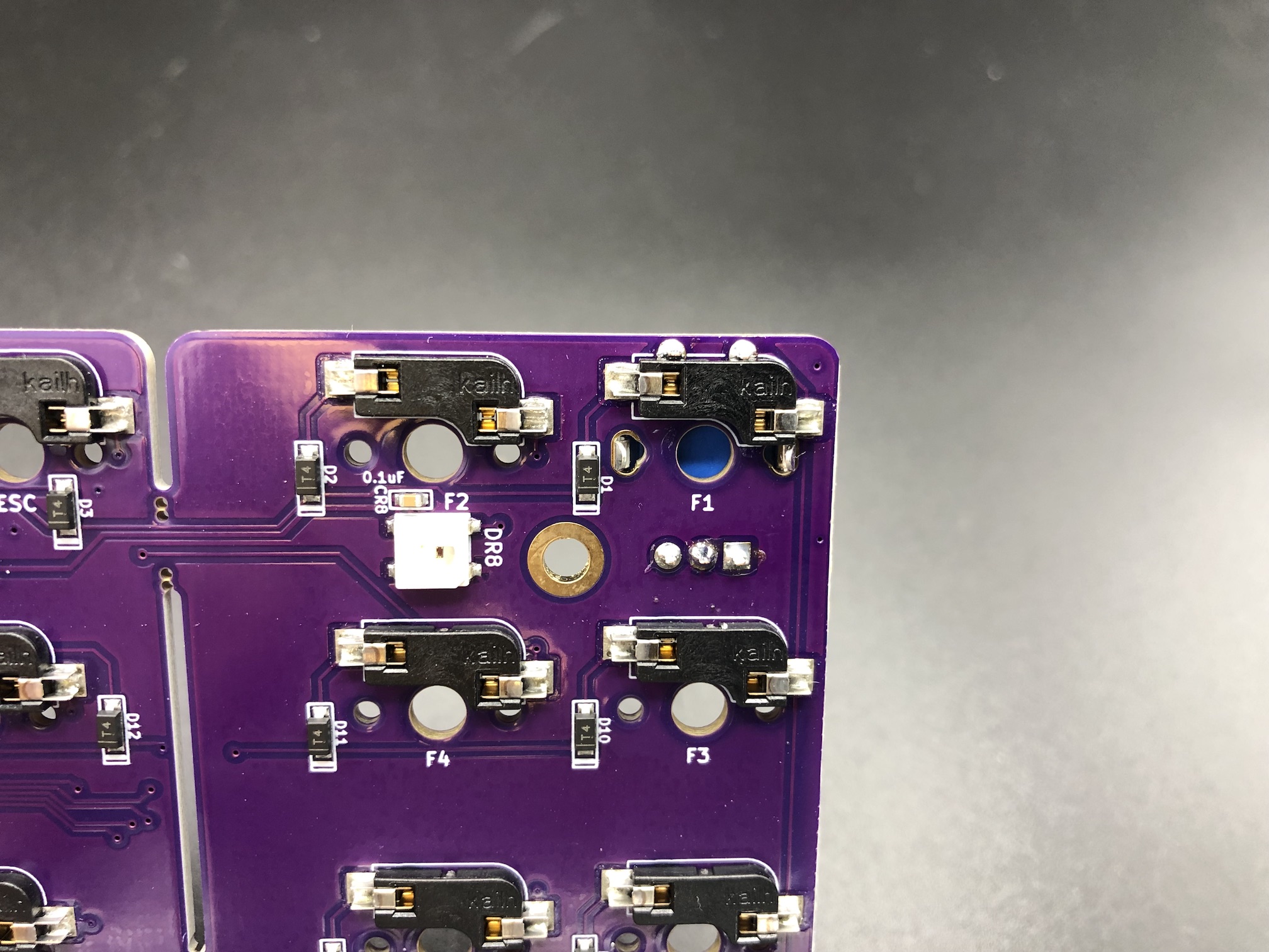 Close-up of encoder solder joints on PCB