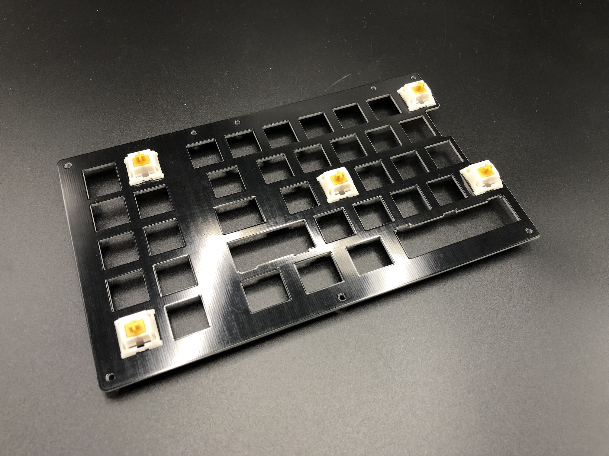 Corner switches inserted in switch plate