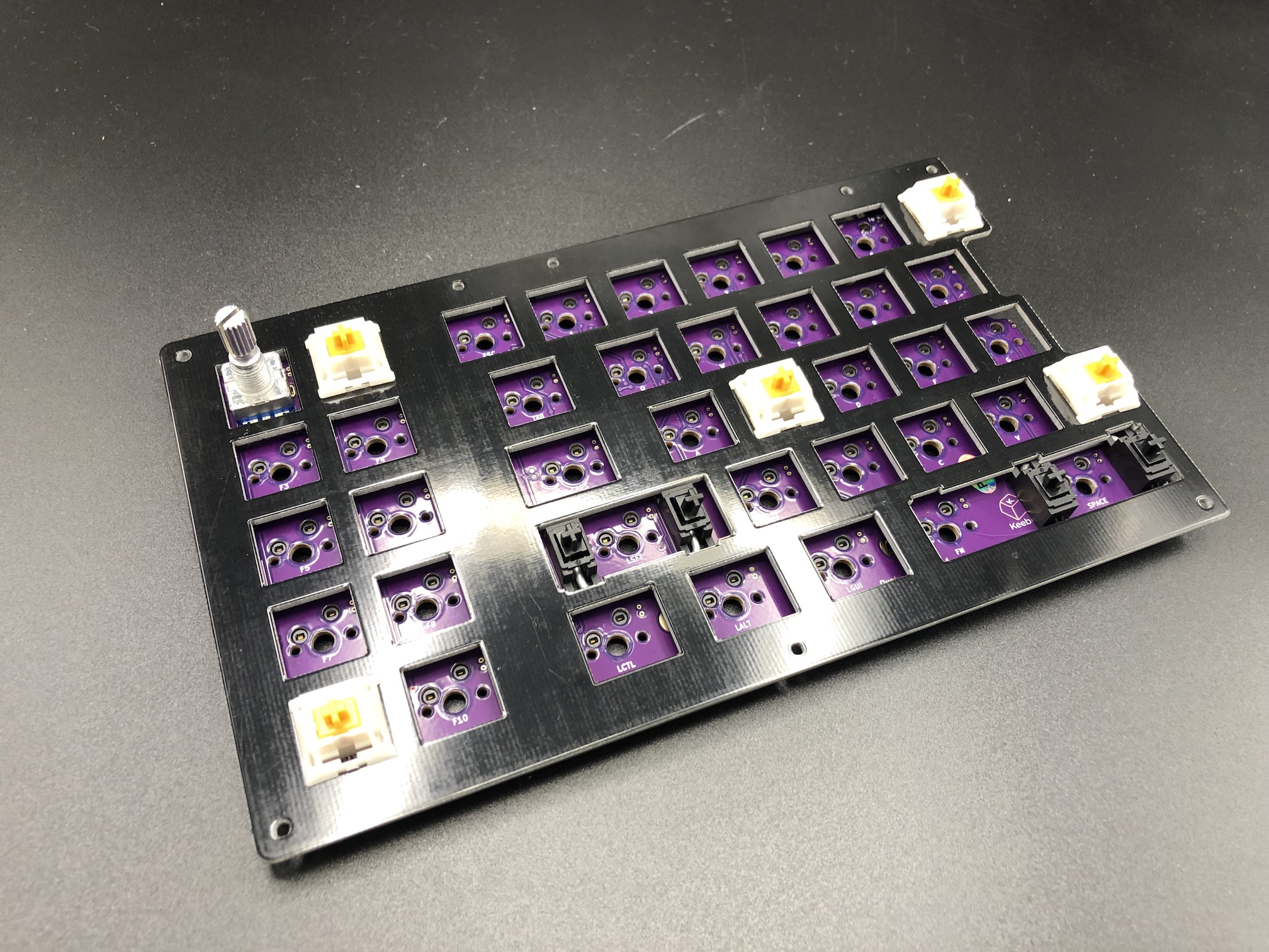 Switch plate placed onto PCB with corner switches