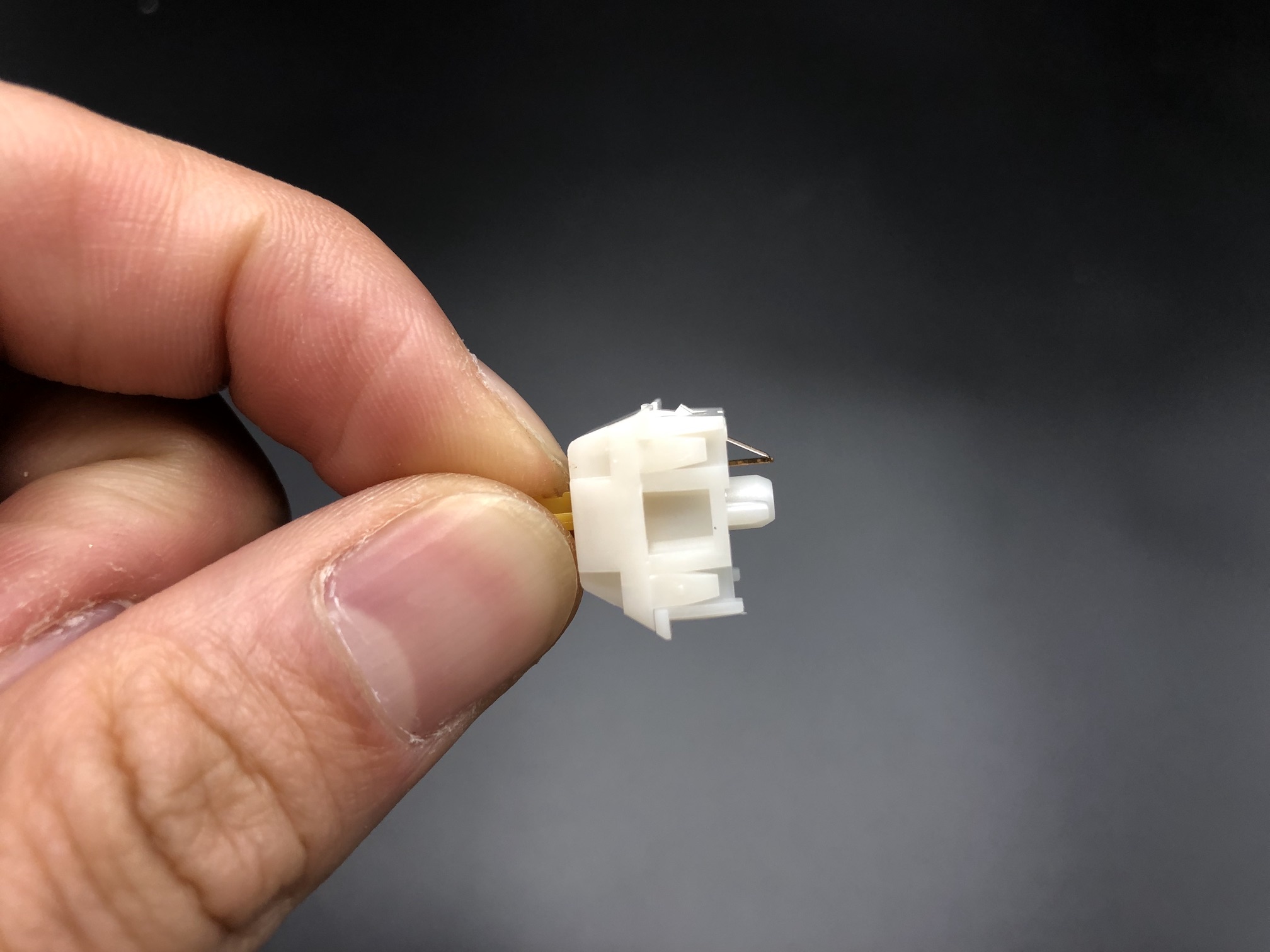 Switch with a bent pin