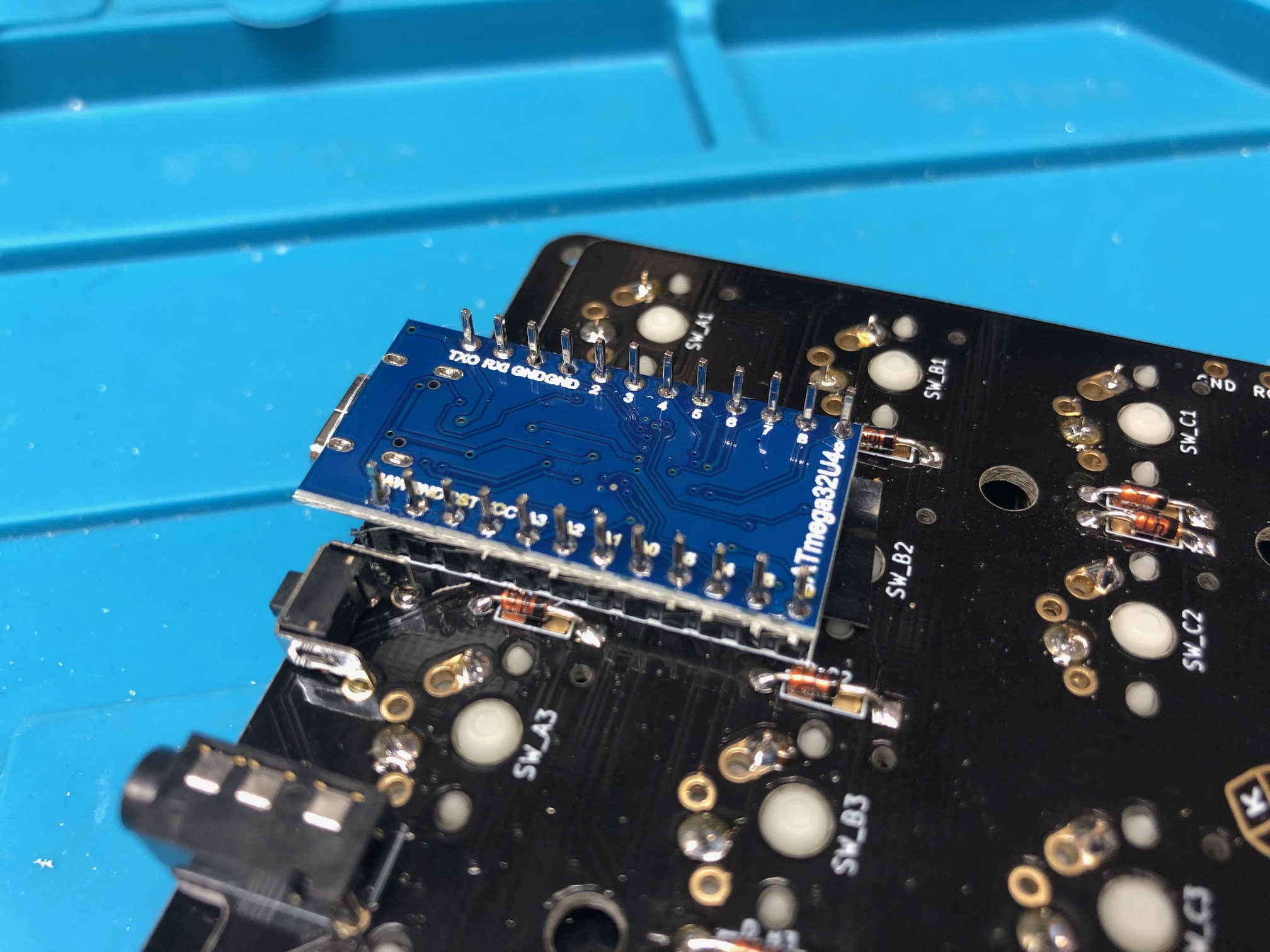 Pro Micro Pins Being Soldered