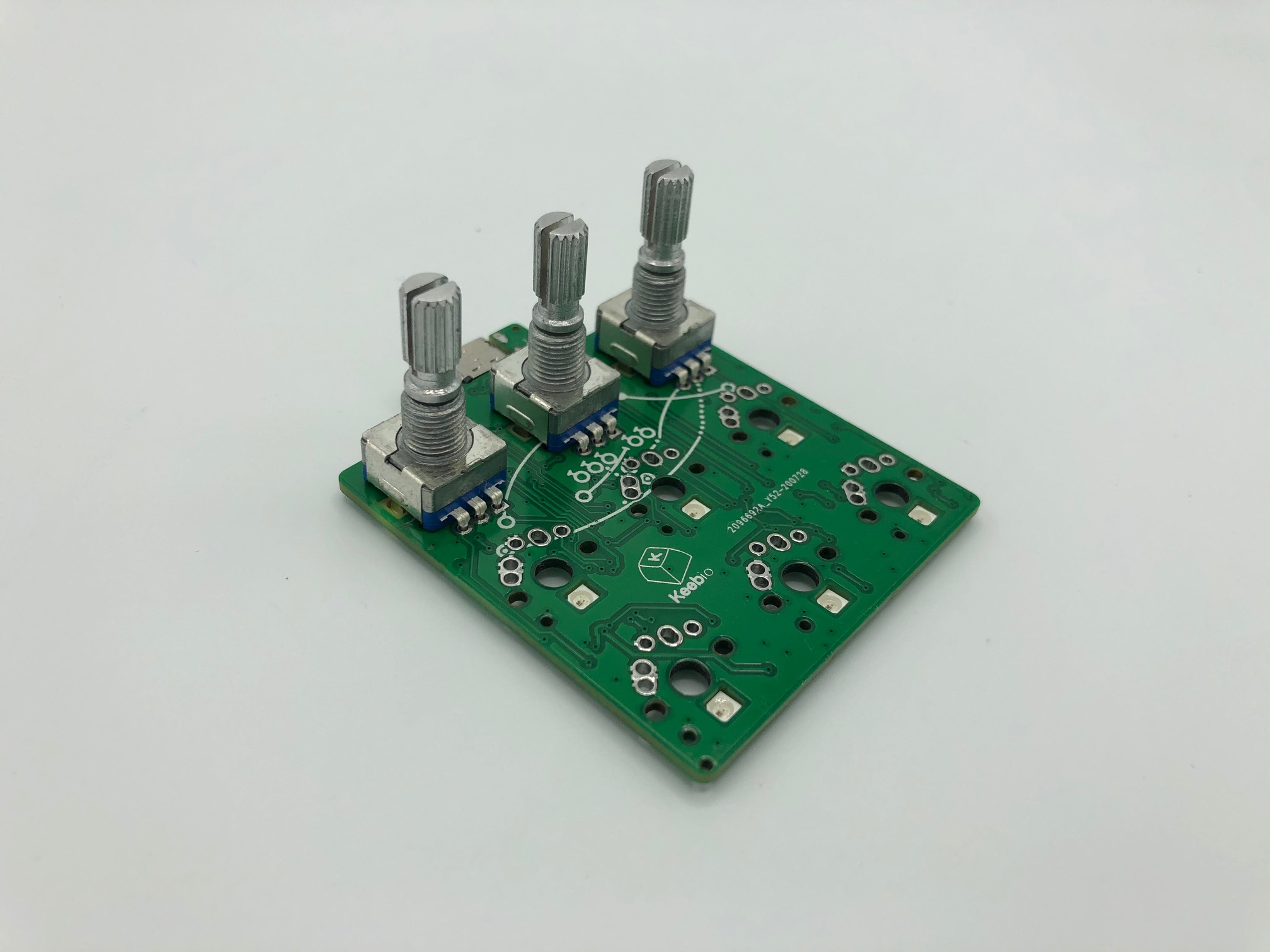 Three rotary encoders soldered to PCB