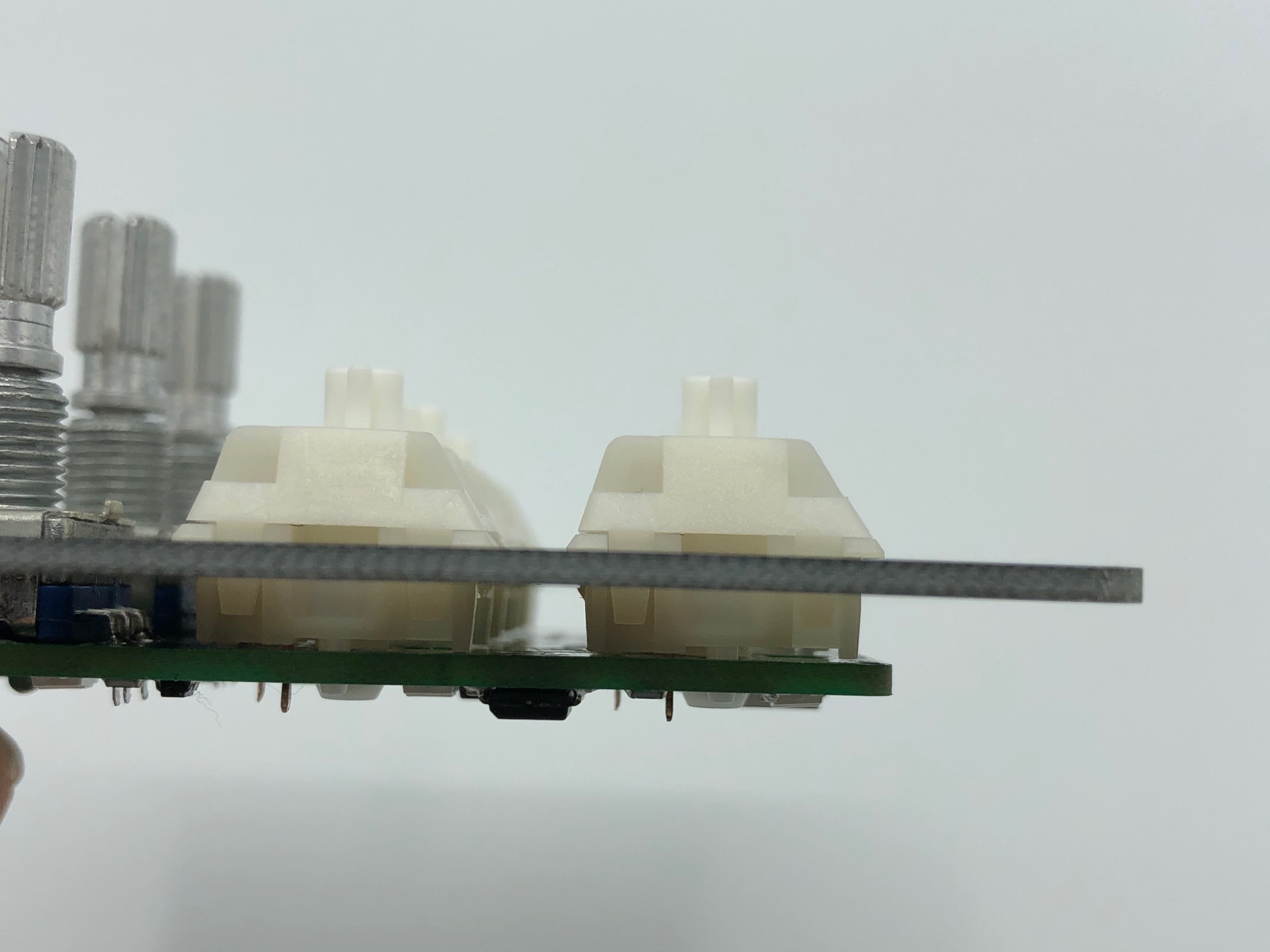 Side view of switches seated in PCB