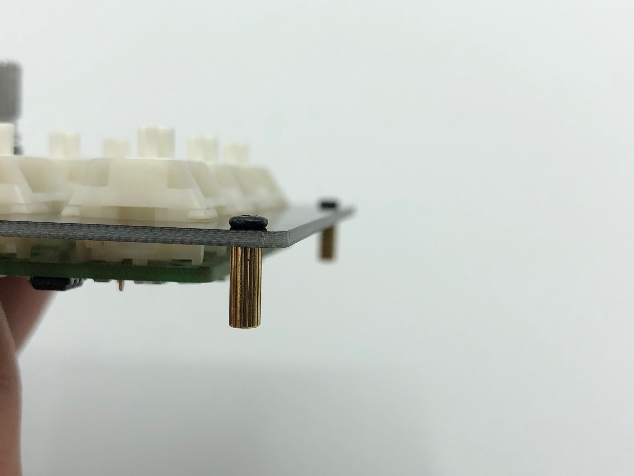 Standoffs attached to switch plate