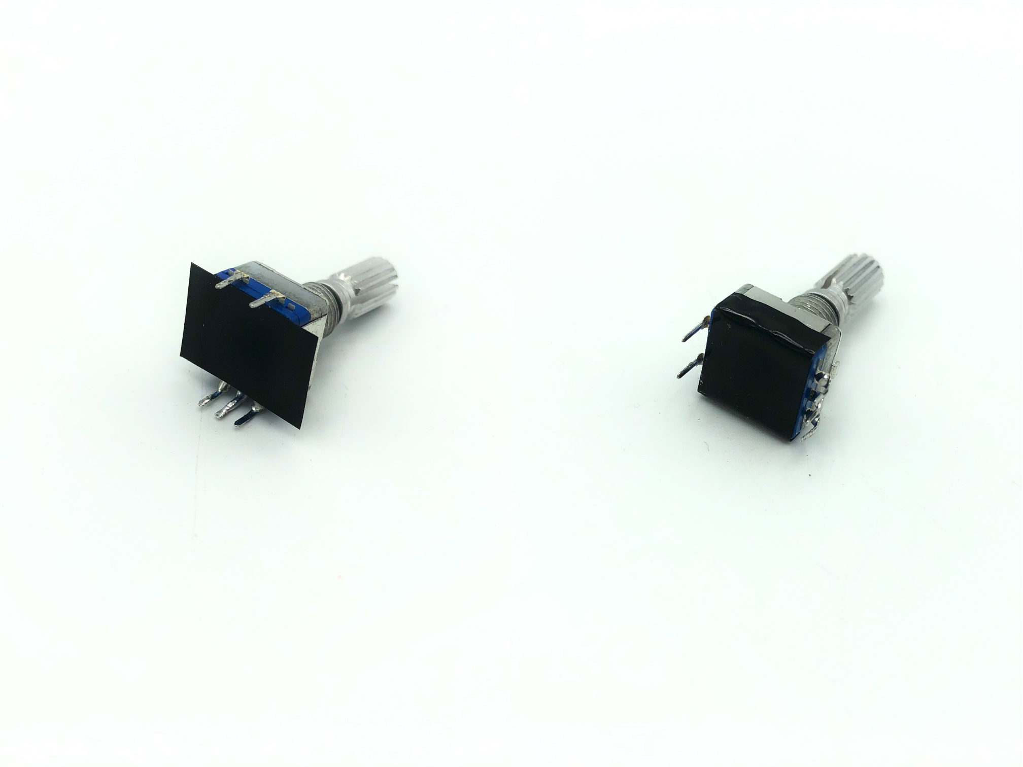 Electrical tape applied to encoder clipped pins