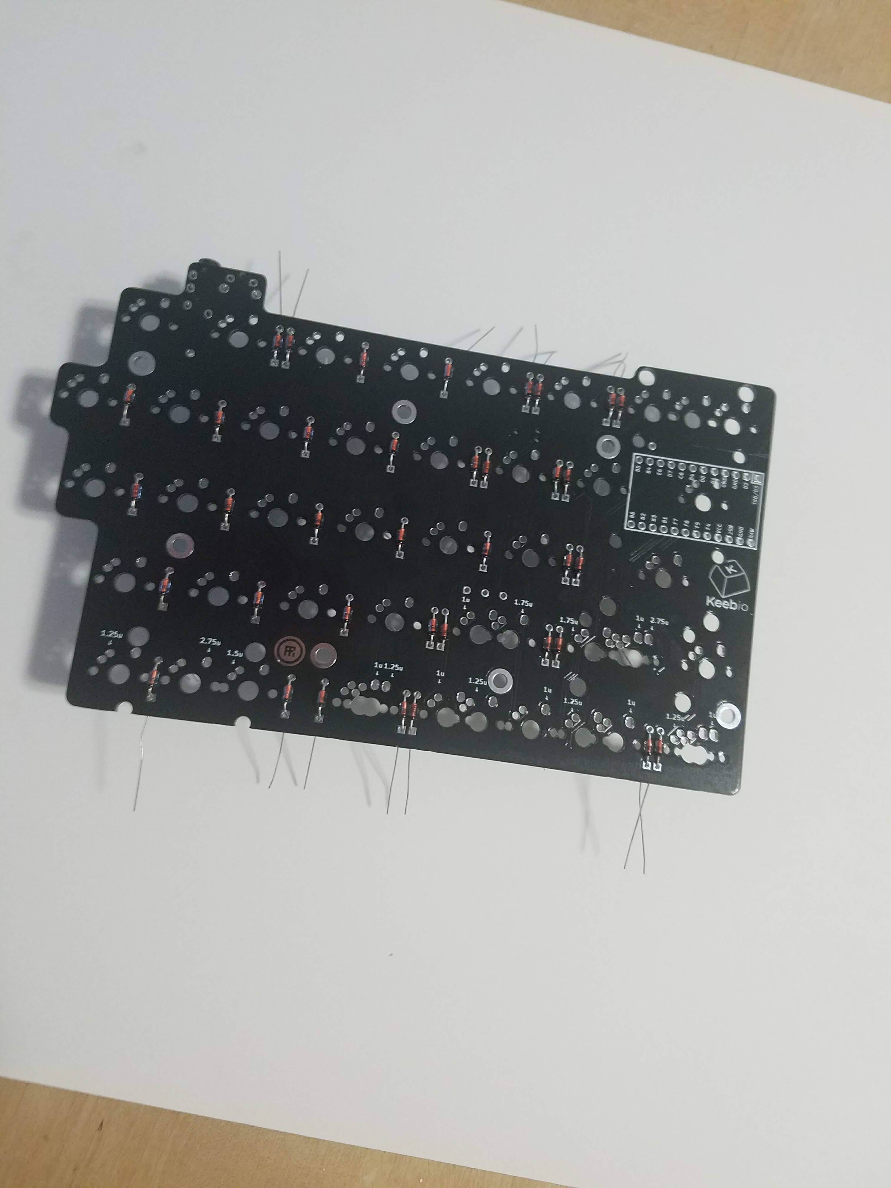 Left PCB with diodes inserted and legs bent out