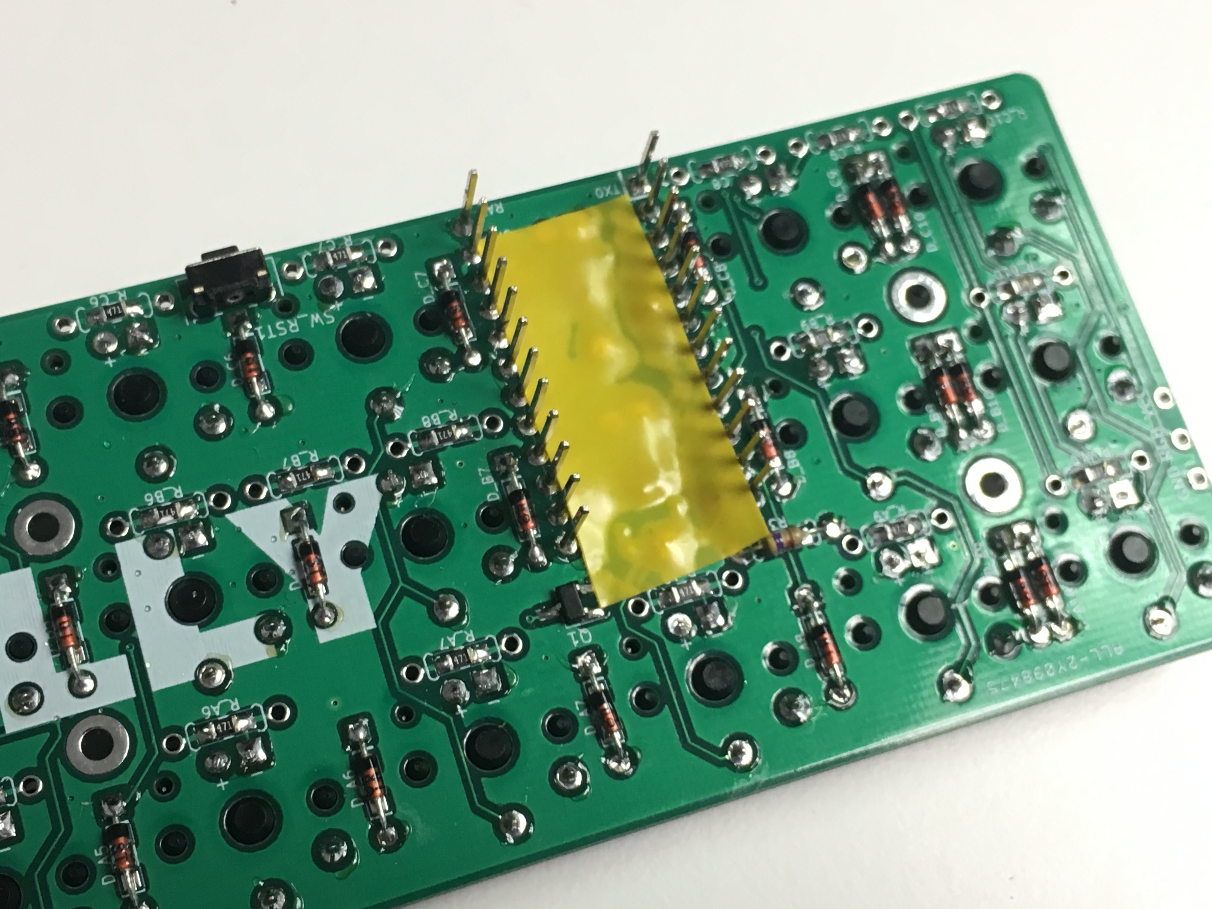 Kapton tape applied over Pro Micro area
