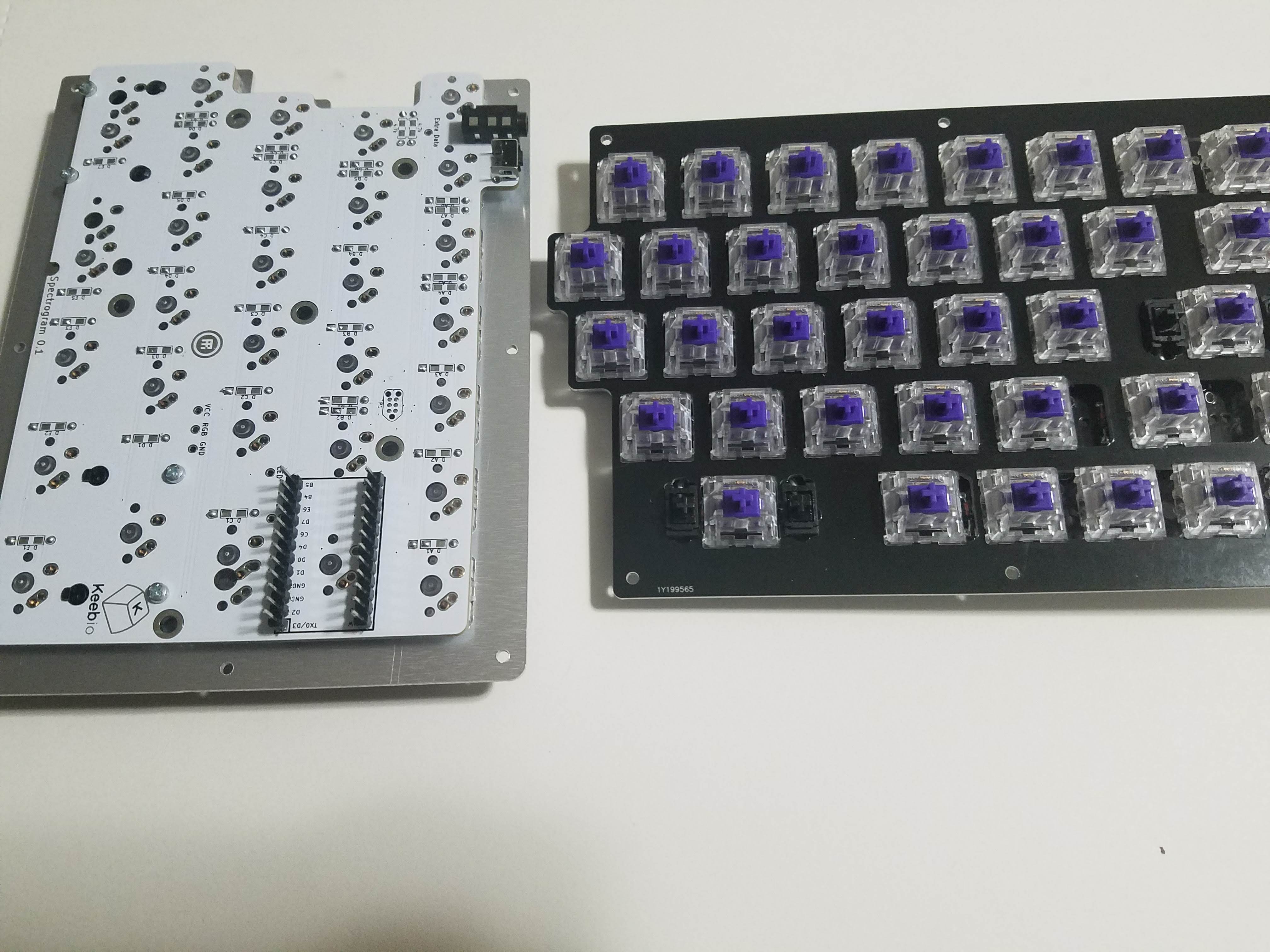 PCB and switch plate with corner switches inserted