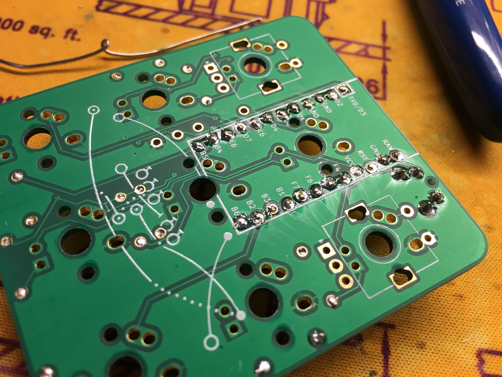 Header pins soldered to PCB