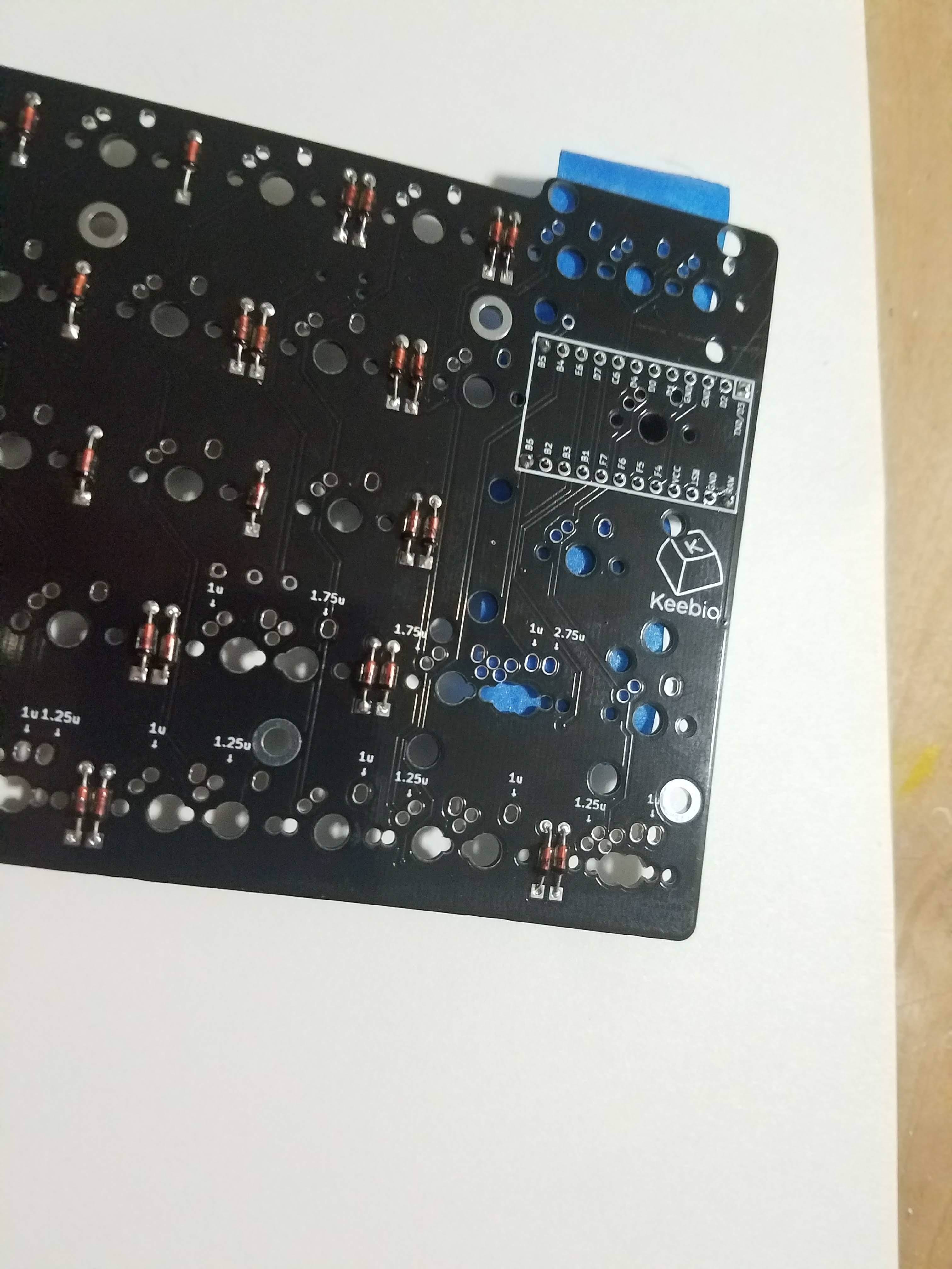 PCB with 4 corner header pins soldered